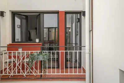 Balcony; natural light, tile floor