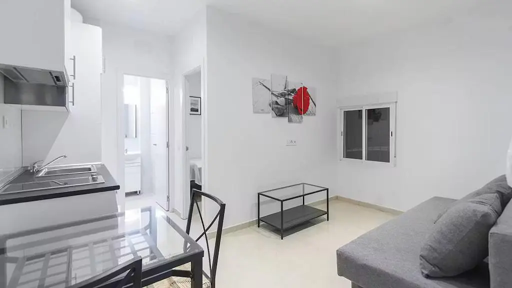 Living room; kitchen appliances, natural light, modern style