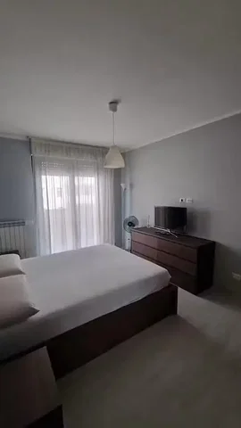 Bedroom; natural light, tile floor