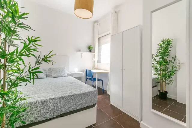 Bedroom; natural light, tile floor