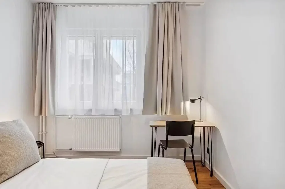 Bedroom; natural light, wood floor