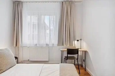 Bedroom; natural light, wood floor