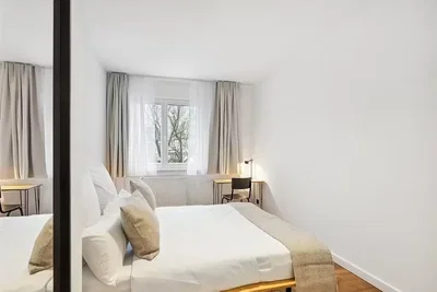 Bedroom; natural light, wood floor
