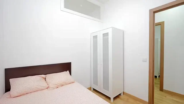 Bedroom; wood floor, natural light