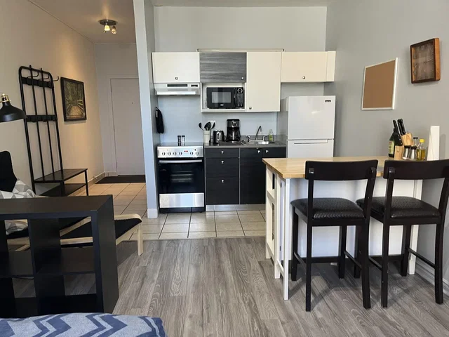 Kitchen; kitchen appliances, tile floor, wood floor