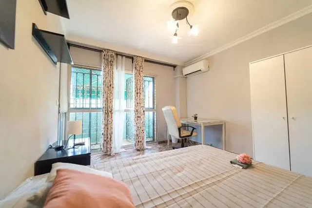 Bedroom; natural light, tile floor