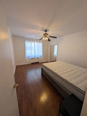 Bedroom; wood floor, natural light