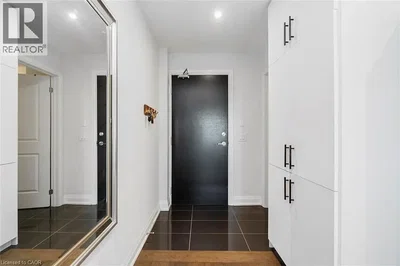 Cloakroom; tile floor, wood floor, natural light, renovated