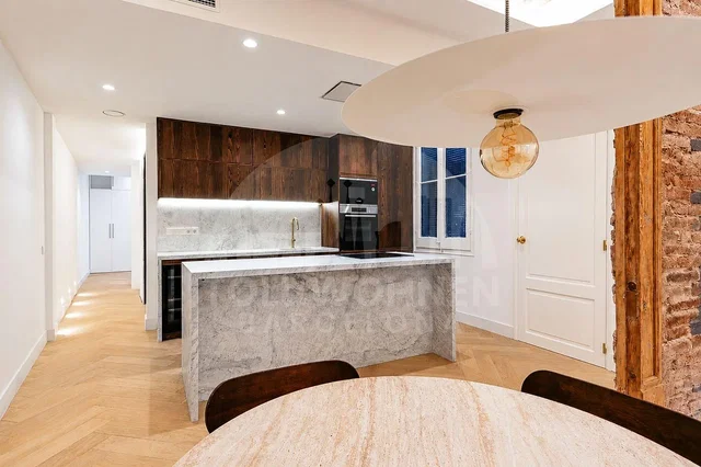 Kitchen; kitchen appliances, wood floor, natural light, modern style, renovated