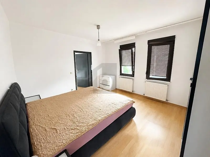 Bedroom; natural light, wood floor