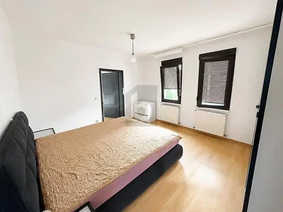Bedroom; natural light, wood floor