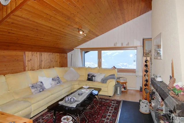 Living room; view, fireplace, wood beams, natural light, rustic style, wood floor