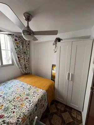 Bedroom; natural light, wood floor