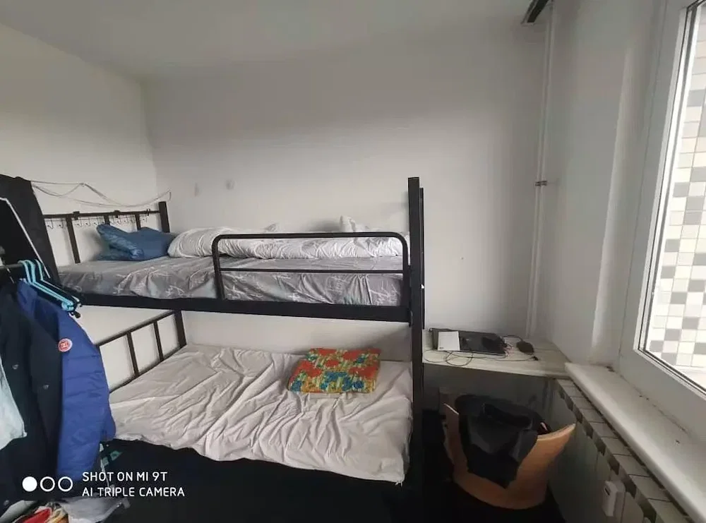Kids room; wood floor, needs renovation, natural light