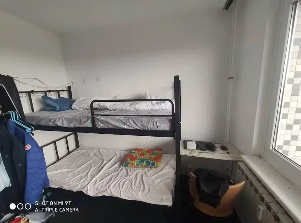 Kids room; wood floor, needs renovation, natural light