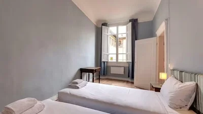 Bedroom; natural light, wood floor