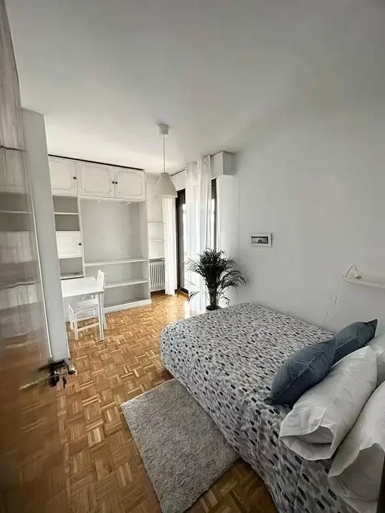 Bedroom; wood floor, natural light