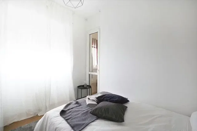 Bedroom; natural light, wood floor