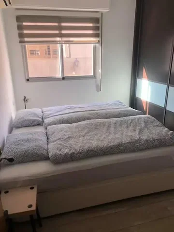 Bedroom; natural light, wood floor