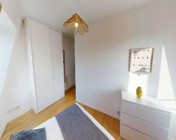 Bedroom; wood floor, natural light