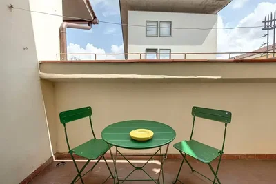 Balcony; natural light, tile floor