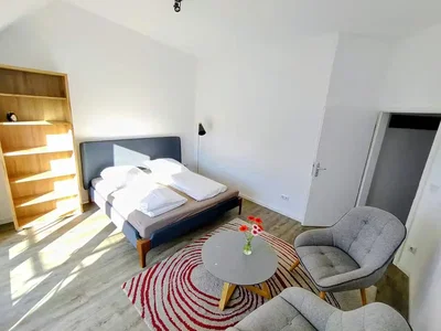 Bedroom; natural light, wood floor