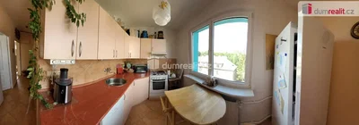 Kitchen; kitchen appliances, natural light, tile floor