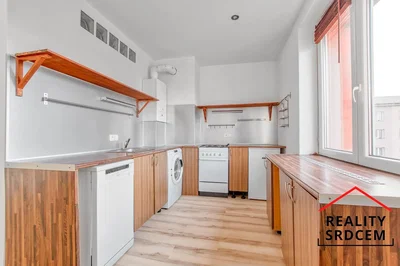 Kitchen; kitchen appliances, wood floor, natural light