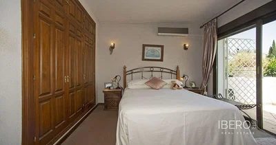 Bedroom; natural light, wood floor