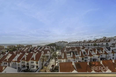 House and surroundings; view