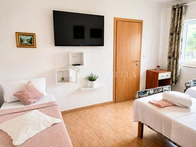 Bedroom; natural light, tile floor