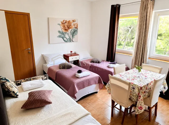 Bedroom; natural light, tile floor