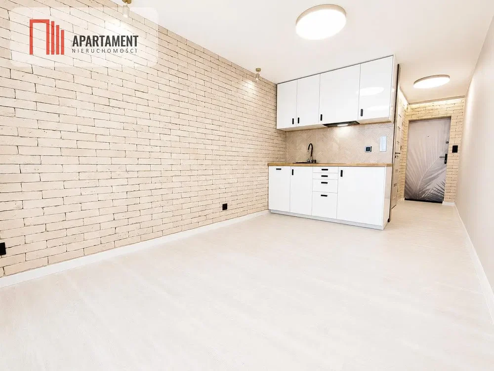 Toilet; renovated, tile floor, wood beams, natural light