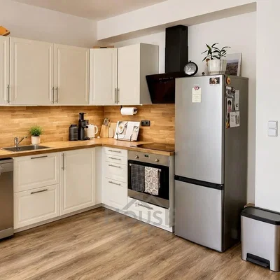 Kitchen; kitchen appliances, wood floor, renovated, natural light