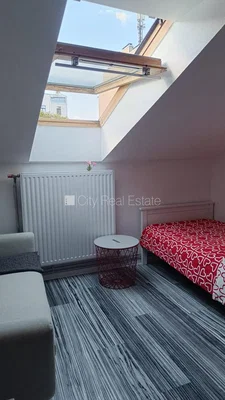 Bedroom; natural light, wood floor
