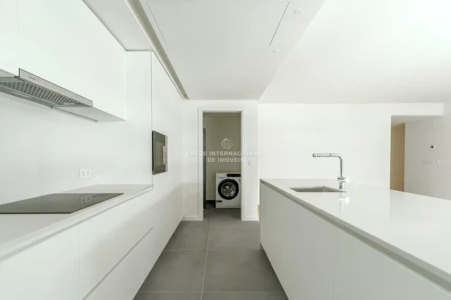 Kitchen; tile floor, kitchen appliances, natural light, renovated
