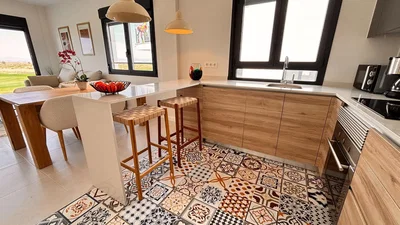 Kitchen; kitchen appliances, tile floor, natural light