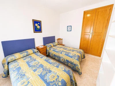 Bedroom; natural light, tile floor