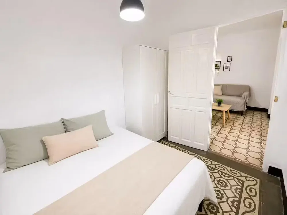 Bedroom; natural light, tile floor