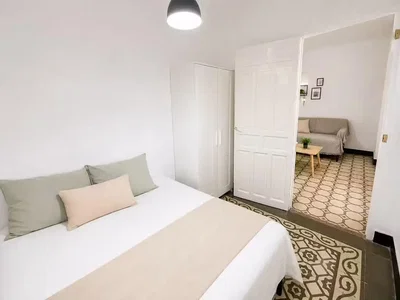 Bedroom; natural light, tile floor