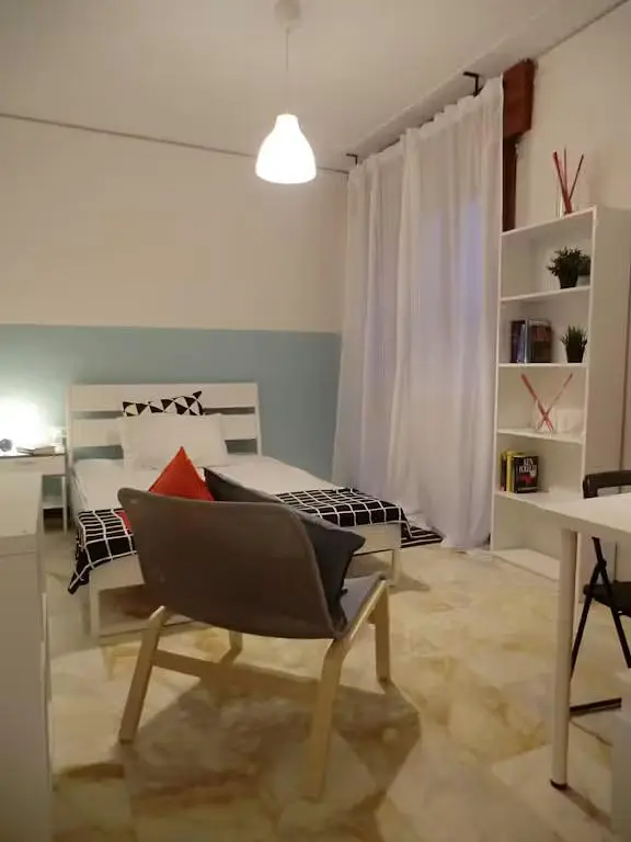 Bedroom; tile floor, natural light