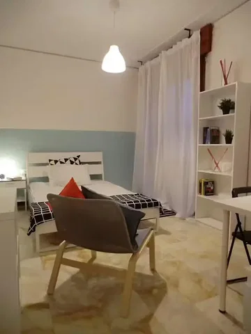Chambre; carrelage, lumière naturelle