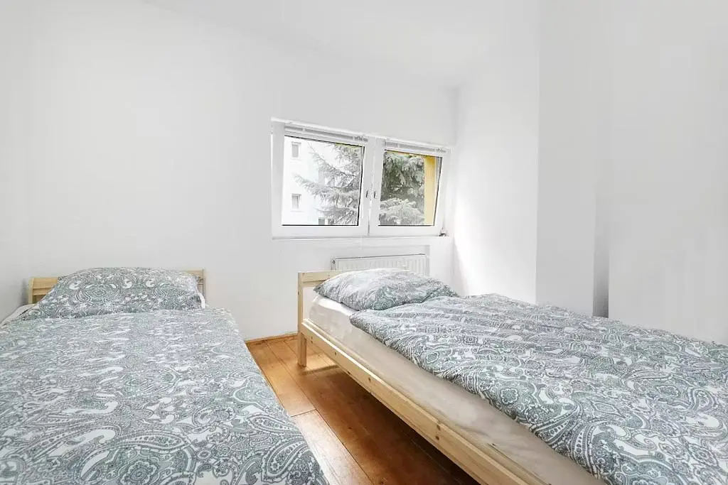 Bedroom; wood floor, natural light