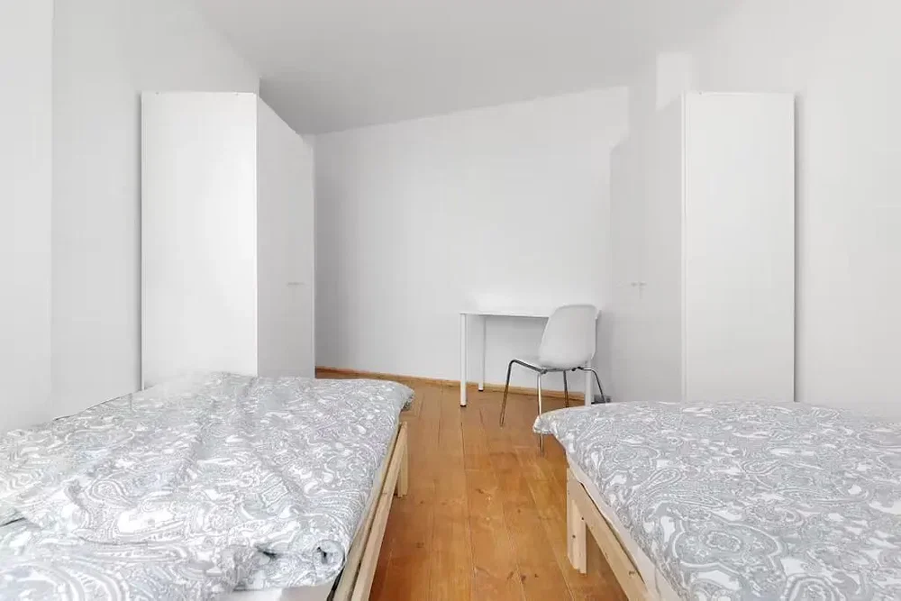 Bedroom; wood floor, natural light