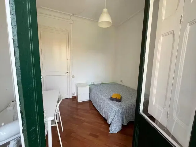 Bedroom; wood floor, natural light