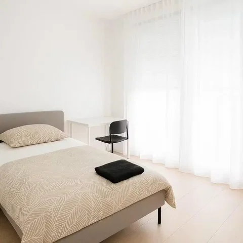Bedroom; natural light, tile floor