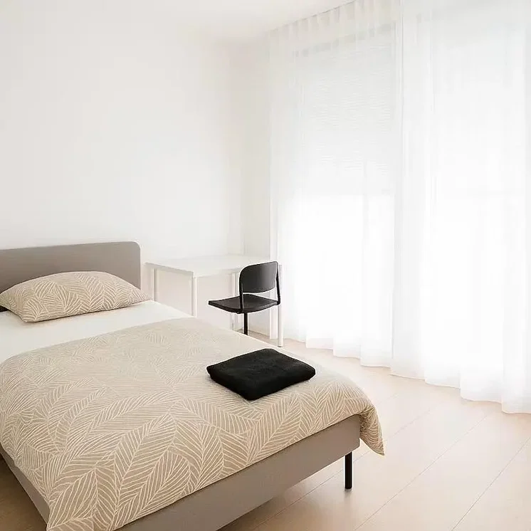 Bedroom; natural light, tile floor