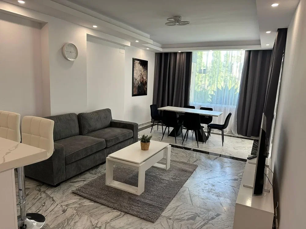 Living room; tile floor, natural light, modern style