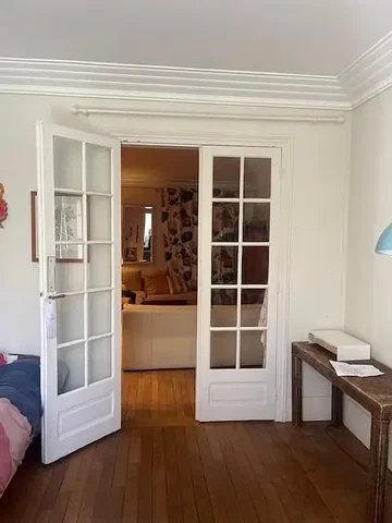 Bedroom; wood floor, natural light