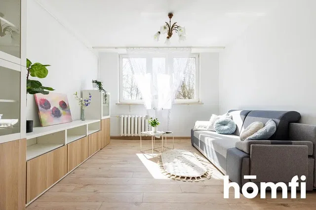Soggiorno; luce naturale, pavimento in legno, stile moderno